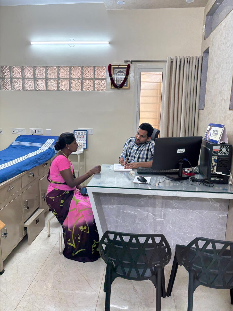 Raghava Hospital care team assisting a patient